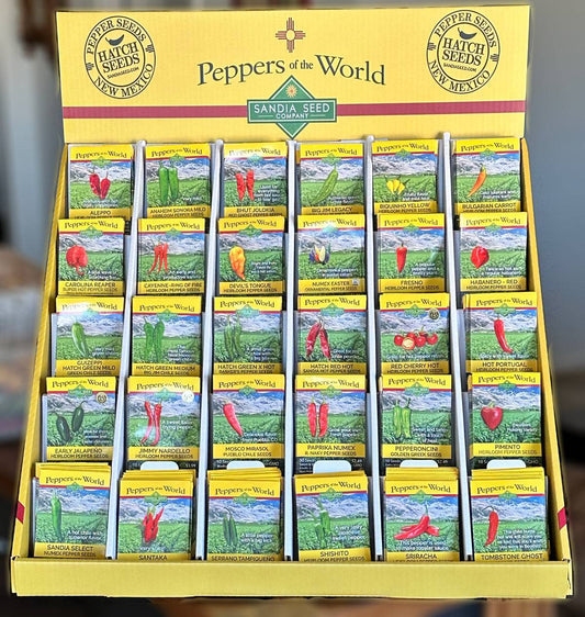 Wholesale Pepper Seed Assortment - 30 Varieties countertop display featuring colorful seed packets from Sandia Seed. Ideal for retail garden centers.