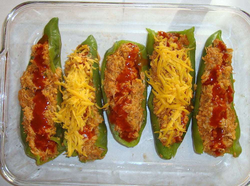 Marconi Giant F1 Pepper Seeds - Smoky-Sweet Flavor - High Yield; stuffed green peppers with shredded cheese and sauce, ideal for grilling recipes.
