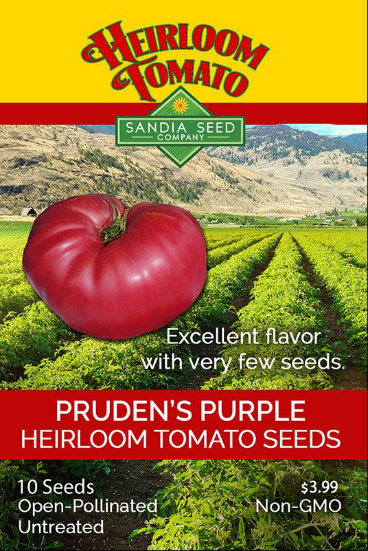 Pruden's Purple Tomato Seeds packet by Sandia Seed Company featuring a large pink heirloom tomato and garden background.