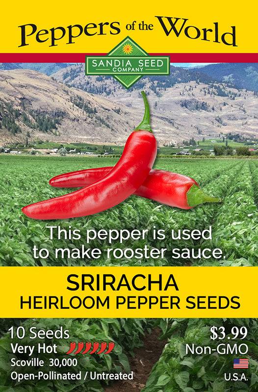 Sriracha Heirloom Pepper Seeds packet by Sandia Seed Company featuring red peppers and mountain farm background, labeled very hot and non-GMO.