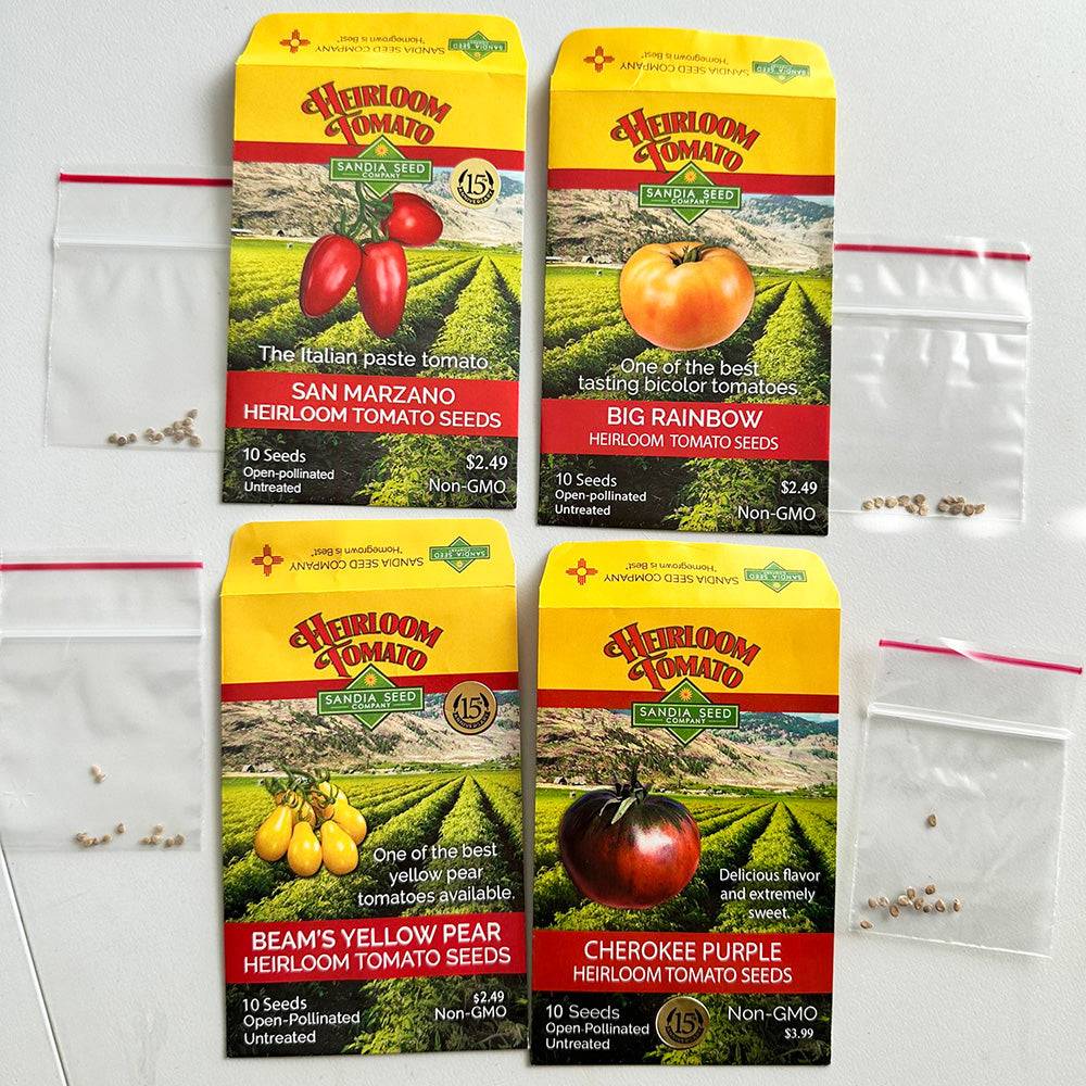 Heirloom Tomato Seeds 4-Pack with labeled packets and seed samples, includes cherry, slicer, paste, and beefsteak varieties.