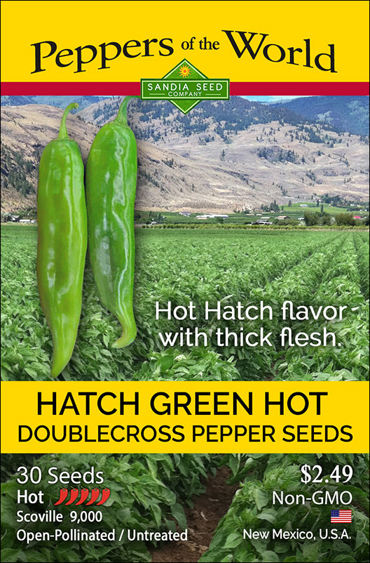 Seed packet for Hatch Green Hot Doublecross Chile Seeds featuring thick-fleshed pods, 9,000 Scoville heat, and non-GMO labeling.
