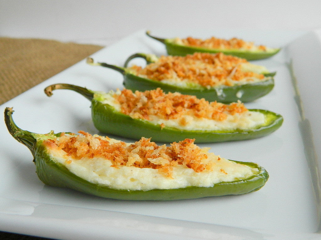 Stuffed Jalapeño Early peppers baked with cheese and breadcrumbs, showcasing culinary use of homegrown jalapeños.
