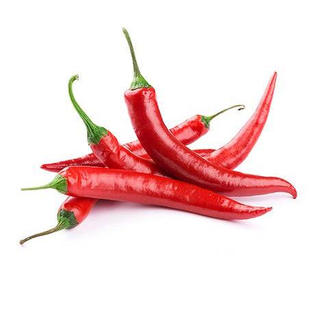 Fresh harvested Cayenne Long Slim hot peppers with glossy red skin. Perfect for drying, pickling, or cooking from homegrown seeds.