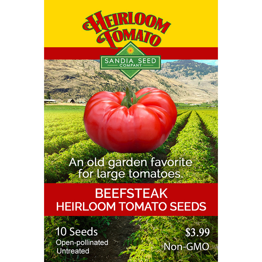 Heirloom tomato seed packet with a red tomato illustration and mountain background