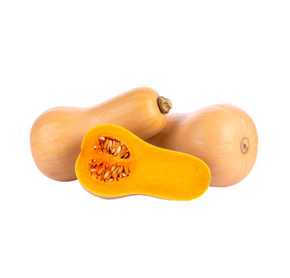 Heirloom butternut squash with smooth beige skin and vibrant orange flesh, sliced to show seeds, ideal for culinary use