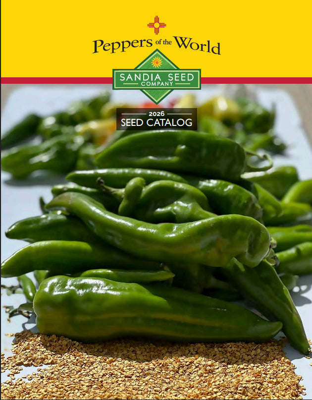 Cover of the 2025 Seed Catalog from Peppers of the World / Sandia Seed Company, featuring a close-up photo of green chili peppers and sesame seeds on a white plate, with a bright yellow header.
