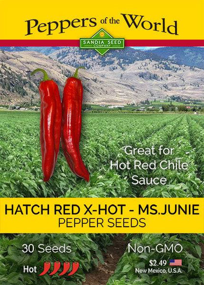 Seed packet for BULK Hatch Red X Hot - Ms. Junie Chile Seeds featuring red chiles and a farm background, ideal for hot red chile sauce lovers.