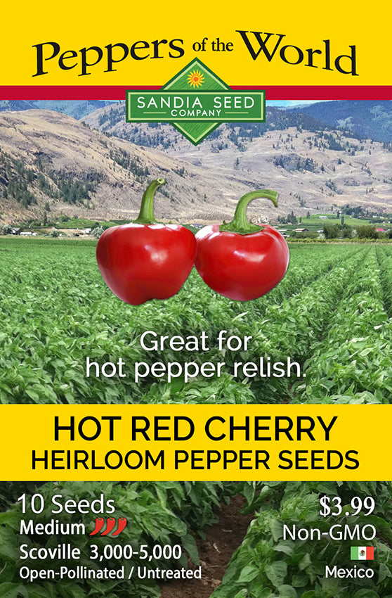 Seed packet design for Sandia Seed Company 'Peppers of the World' Hot Red Cherry Heirloom Pepper Seeds, featuring two floating red peppers over a green pepper field with mountains in the background.