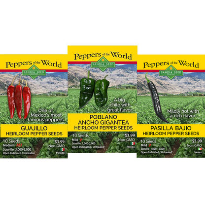 Three seed packet designs for Savda Seed 'Peppers of the World' displayed side by side on a white background. The packets are for Guajillo, Poblano Ancho, and Pasilla Bajo heirloom pepper seeds.