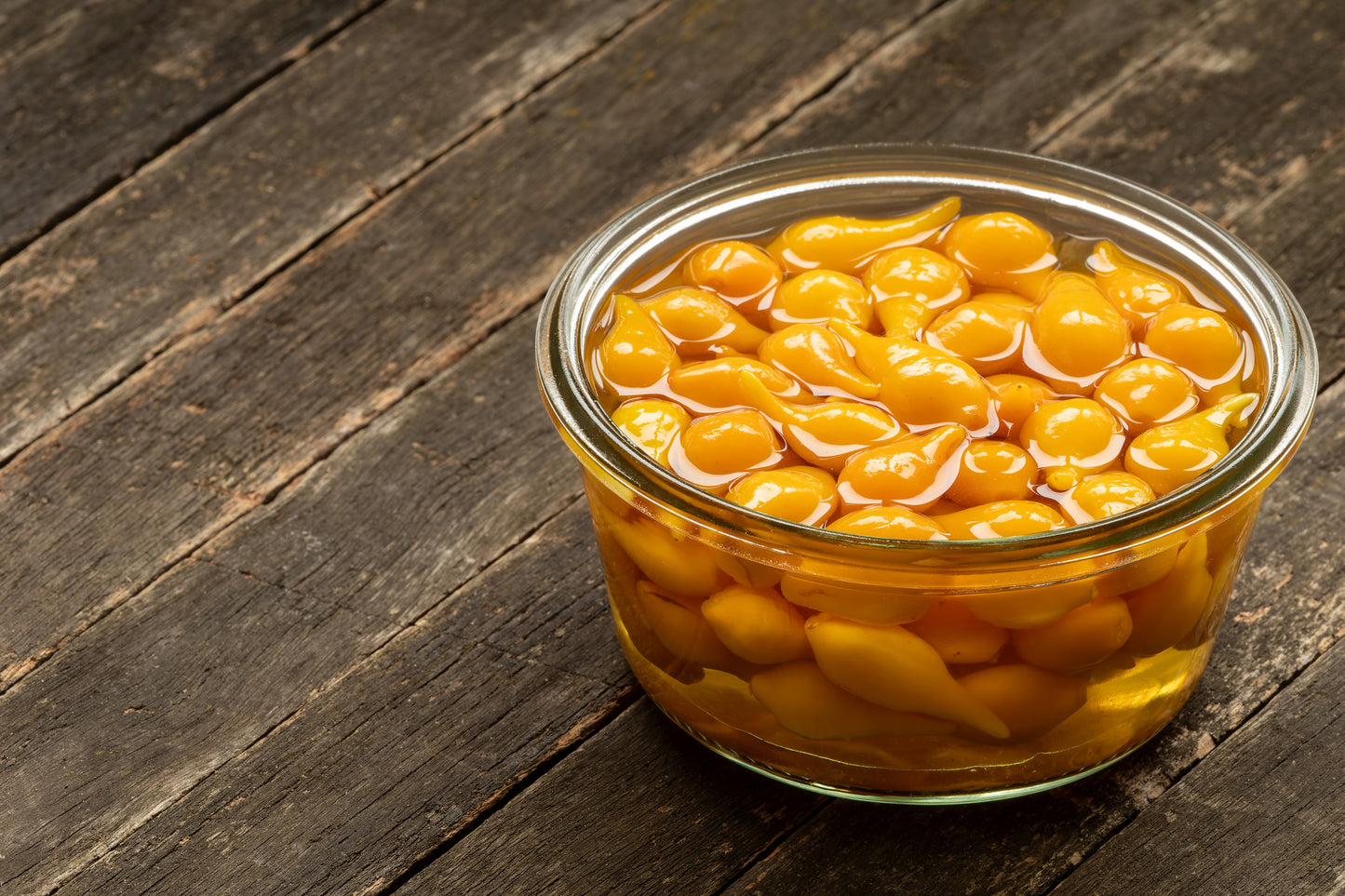 Jar of pickled Biquinho Peppers grown from Seeds