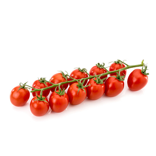 Bunch of red tomatoes on a white background