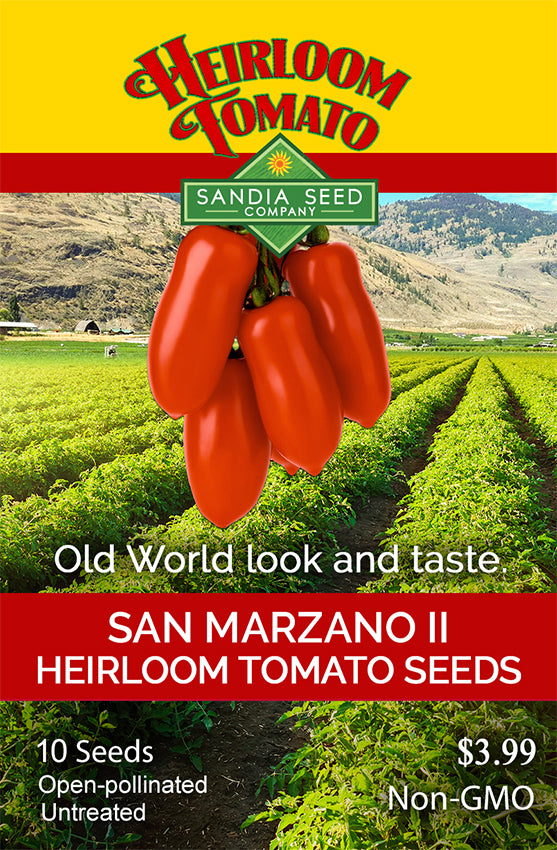 Seed packet design for Sandia Seed Company Heirloom Tomato seeds, featuring a large red tomato cluster over a green tomato field with mountains, plus text reading 'SAN MARZANO II HEIRLOOM TOMATO SEEDS' and '10 Seeds Open-pollinated Untreated Non-GMO $3.99'.