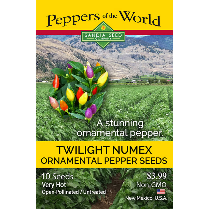 Peppers of the World Twilight Numex pepper seeds packaging with a scenic background