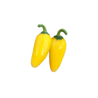 Jalapeño Lemon Spice NuMex Seeds produce vibrant yellow peppers with a glossy finish, ideal for spicy home garden harvests.